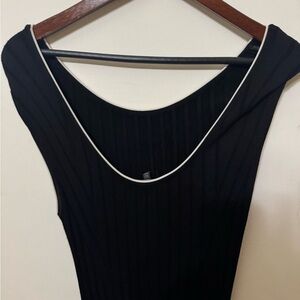 Black Sleeveless Top with White Trim